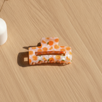 Appelsin design på hårklype